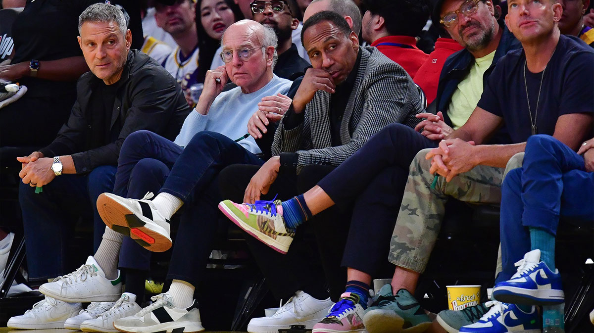 Comedian Larry David and sports media personality Stephen A. Smith attend the game between the Los Angeles Lakers and New York Knicks during the first half at Crypto.com Arena.