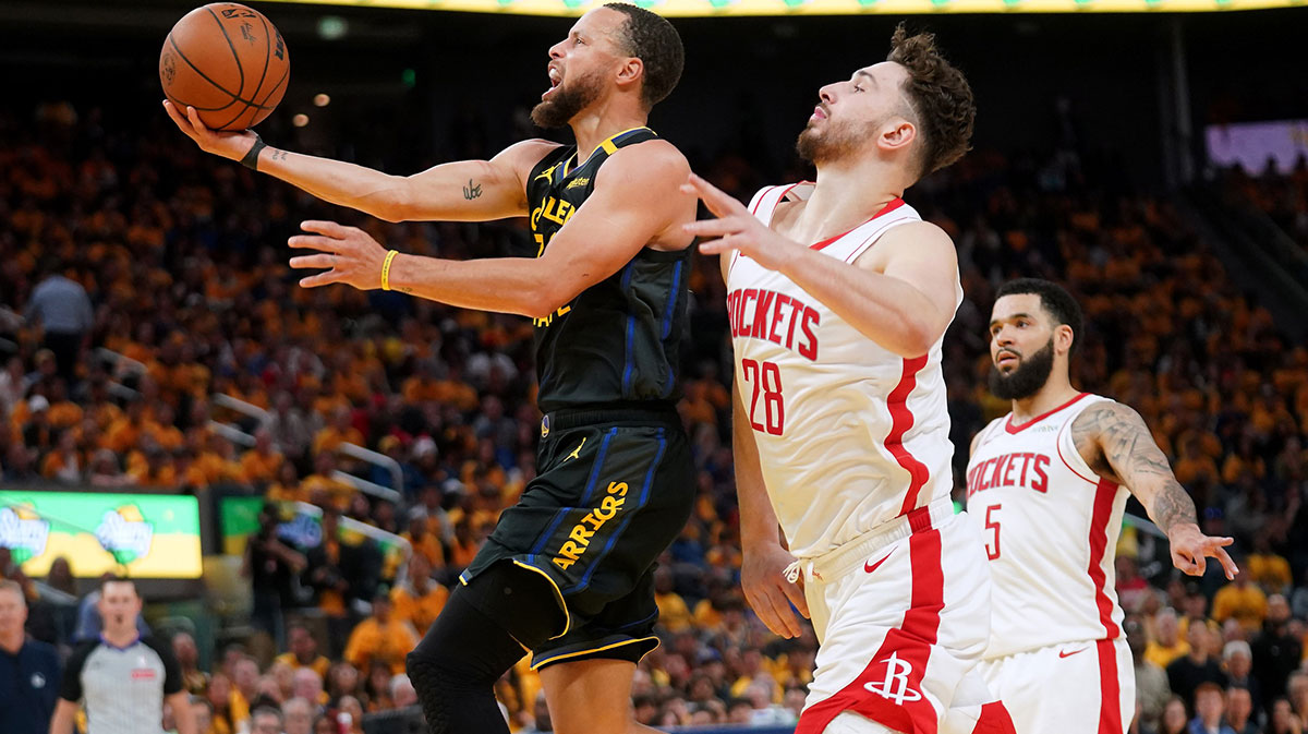 Golden State Warriors guard Stephen Curry (30) drives to the hoop in front of Houston Rockets center Alperen Sengun (28) in the third quarter of game six of the first round for the 2025 NBA Playoffs at Chase Center.