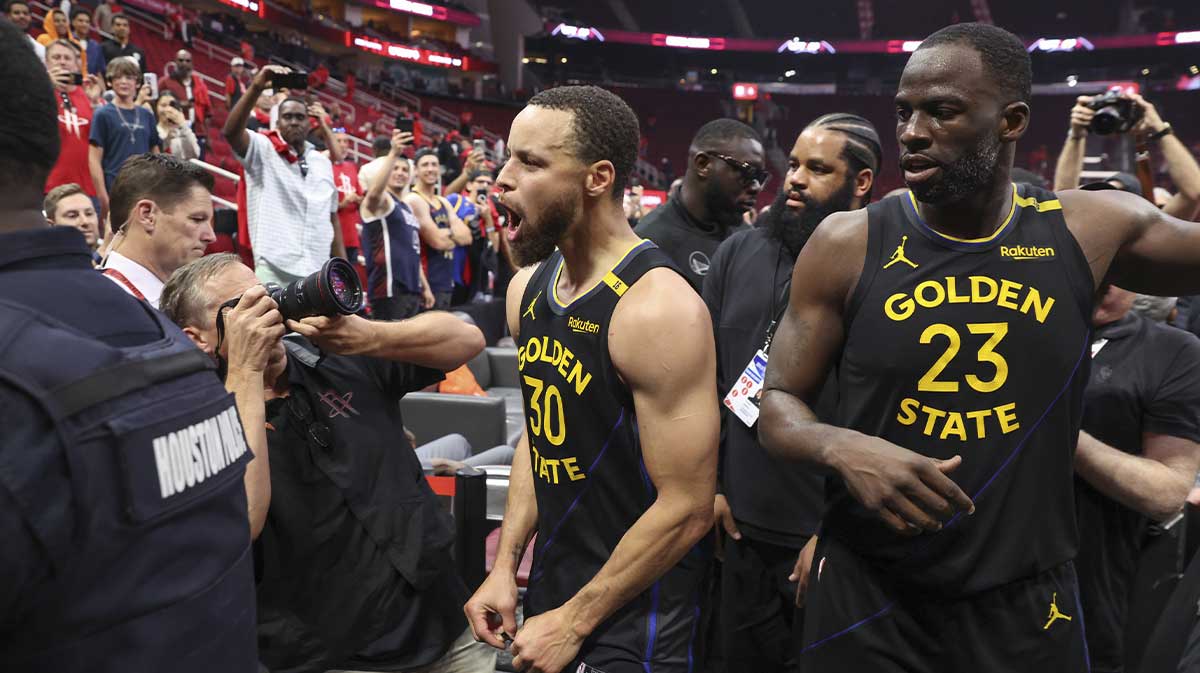 Golden State Warriors guard Stephen Curry (30) and forward Draymond Green (23) walk off the court after game seven of the first round for the 2025 NBA Playoffs against the Houston Rockets at Toyota Center.
