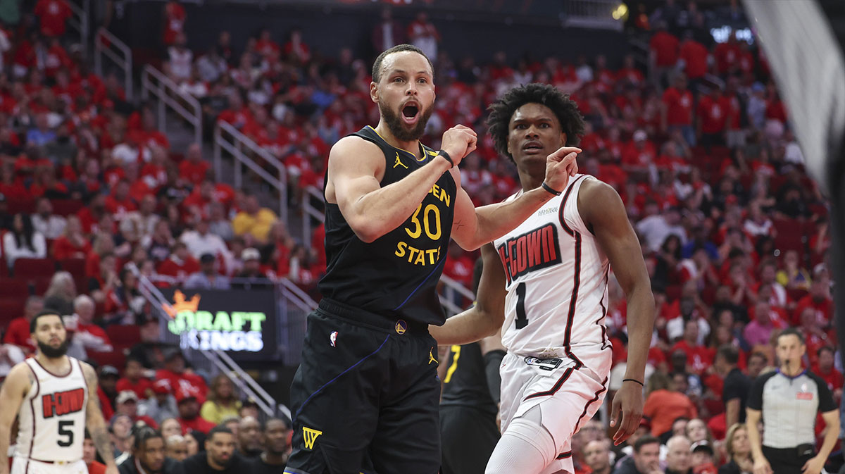 Golden State Warriors guard Stephen Curry (30) and Houston Rockets forward Amen Thompson (1) react after a play during the fourth quarter of game seven of the first round for the 2025 NBA Playoffs at Toyota Center.