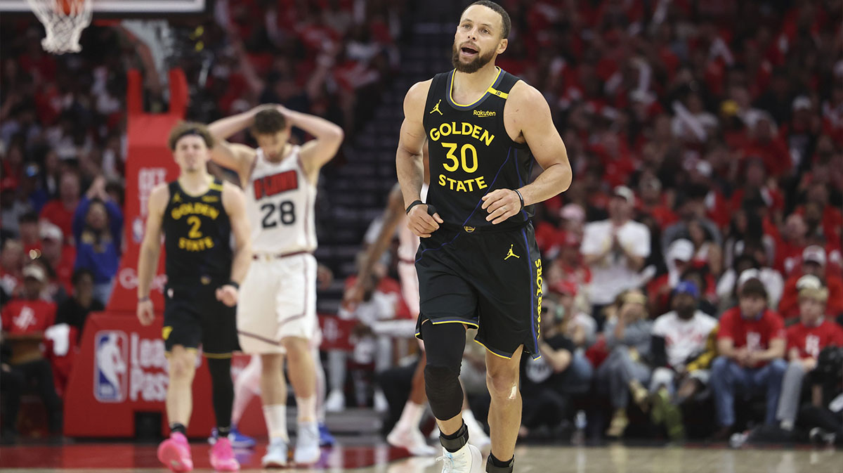 Golden State Warriors guard Stephen Curry (30) reacts after scoring a basket during the second half of game seven of the first round for the 2025 NBA Playoffs against the Houston Rockets at Toyota Center.