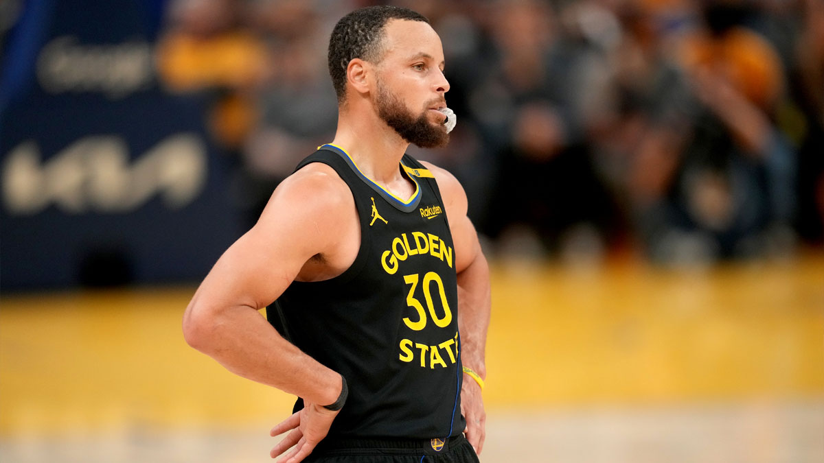 Golden State Warriors guard Stephen Curry (30) stands on the court during a break in the action against the Houston Rockets in the fourth quarter of game six of the first round for the 2025 NBA Playoffs at Chase Center.