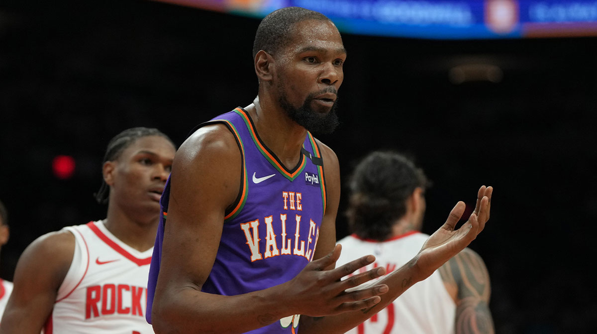 Phoenix Suns forward Kevin Durant (35) reacts after fouling a Houston Rockets player in the first half at Footprint Center.