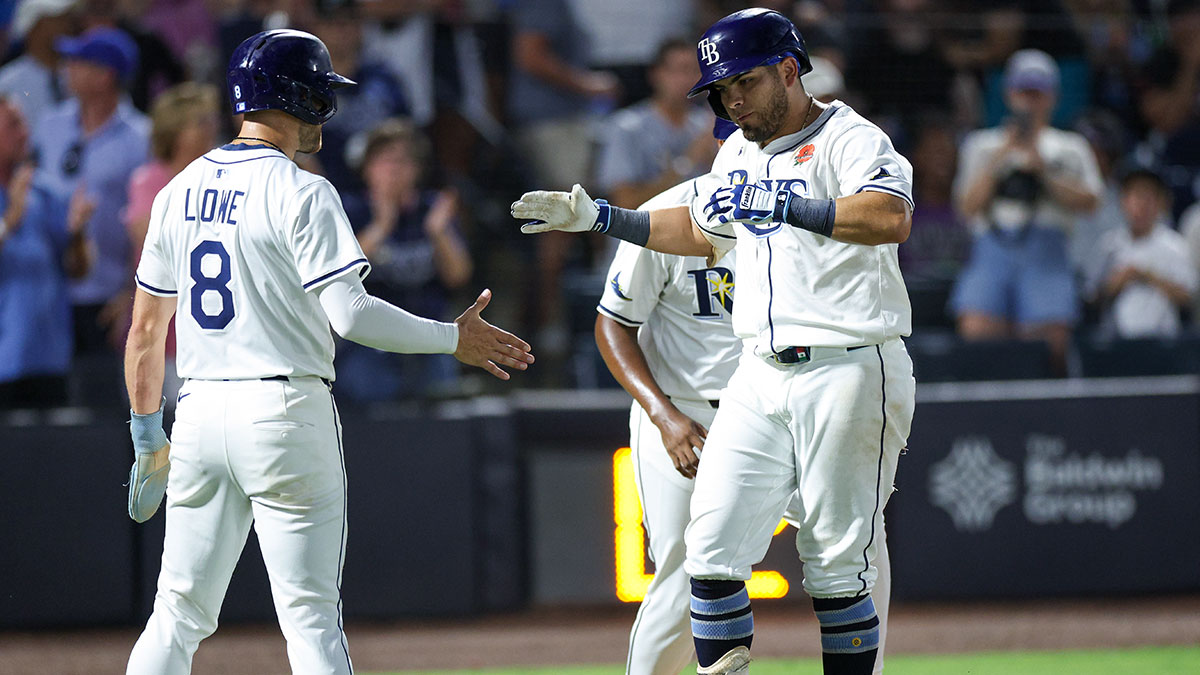 Tampa Bay Rays first baseman Jonathan Aranda (62) celebrates with designated hitter Brandon Lowe (8) after hitting a three run home run against the Minnesota Twins in the sixth inning at George M. Steinbrenner Field.