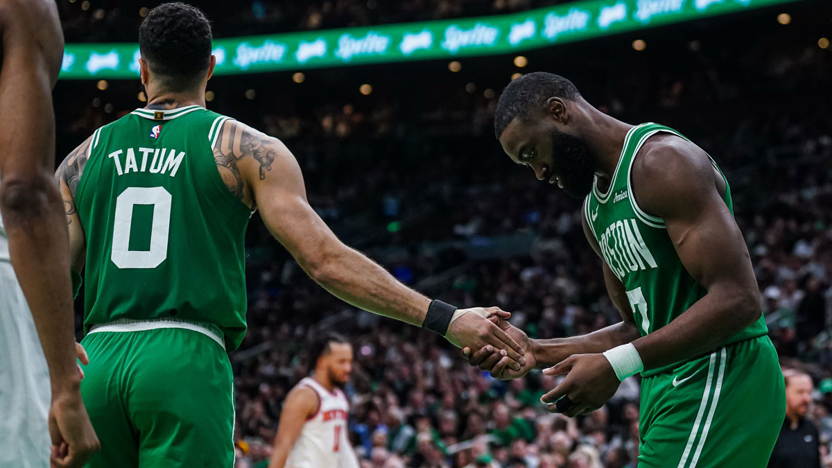 Boston Celtics guard Jaylen Brown (7) reacts after missing a pass from Boston Celtics forward Jayson Tatum (0) against the New York Knicks in the second half during game two of the second round for the 2025 NBA Playoffs at TD Garden.