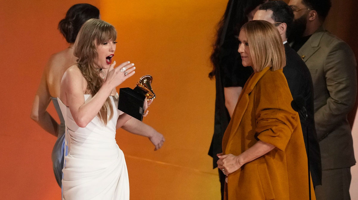 Taylor Swift, who did not announce Reputation (Taylor's Version) at the 2025 AMAs, winning Album of the Year at the Grammys.