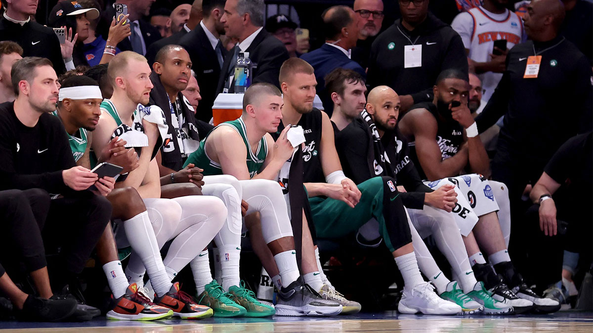 Boston Celtics players watch from the bench during the end of the fourth quarter of game six in the second round of the 2025 NBA Playoffs against the New York Knicks at Madison Square Garden.