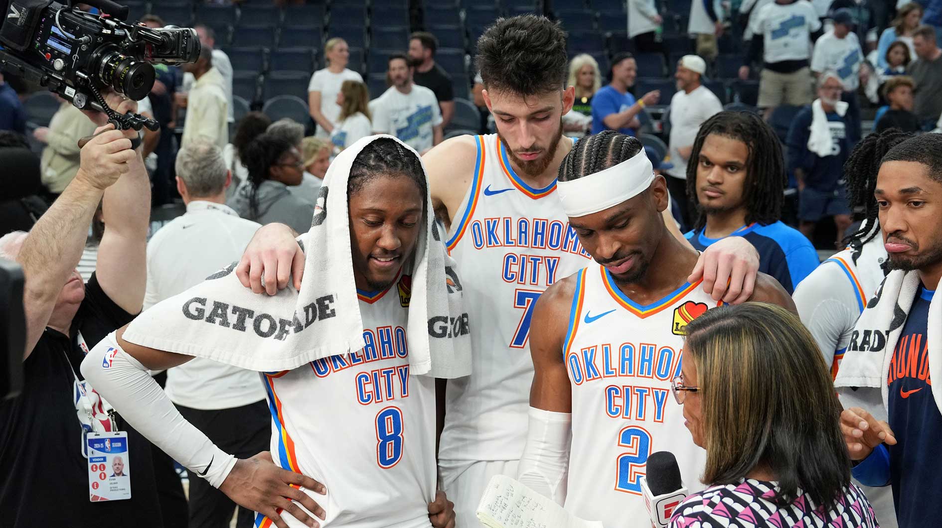 Oklahoma City Thunder forward Jalen Williams (8), forward Chet Holmgren (7) and guard Shai Gilgeous-Alexander (2) talk to the media after defeating the Minnesota Timberwolves in game four of the western conference finals for the 2025 NBA Playoffs at Target Center.