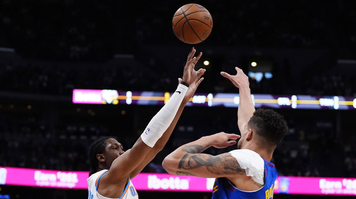 Thunder forward Jalen Williams (8) shoots the ball over Denver Nuggets forward Michael Porter Jr. (1) in the first quarter during game three of the second round for the 2025 NBA Playoffs at Ball Arena