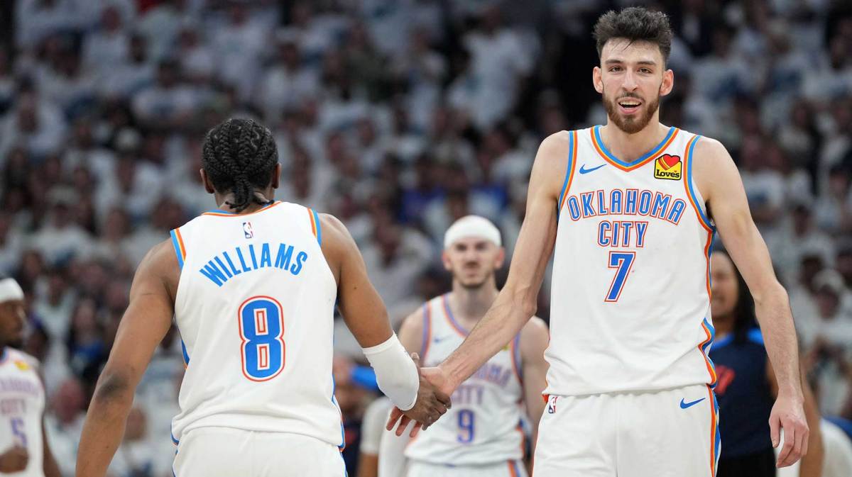 Thunder forward Chet Holmgren (7) reacts with forward Jalen Williams (8) in the second half during game four of the western conference finals for the 2025 NBA Playoffs at Target Center with the Nuggets and Thunder head coach Mark Daigneault in the background