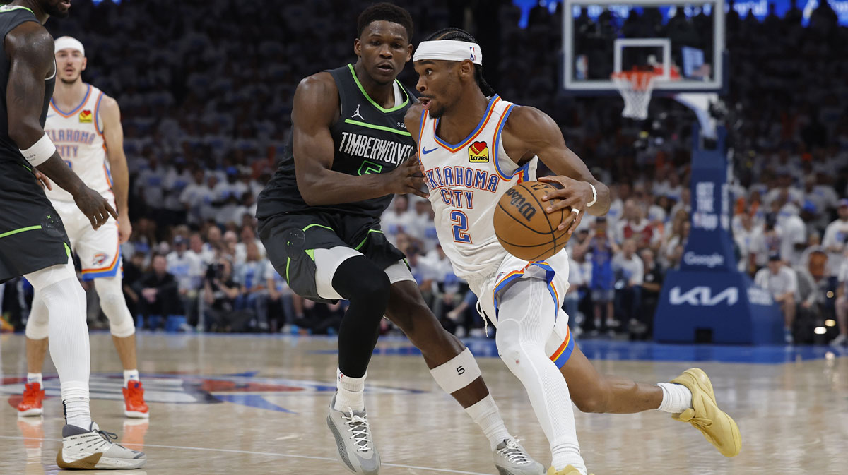 Thunder guard Shai Gilgeous-Alexander (2) drives against Minnesota Timberwolves guard Anthony Edwards (5) in the fourth quarter during game one of the western conference finals for the 2025 NBA Playoffs at Paycom Center
