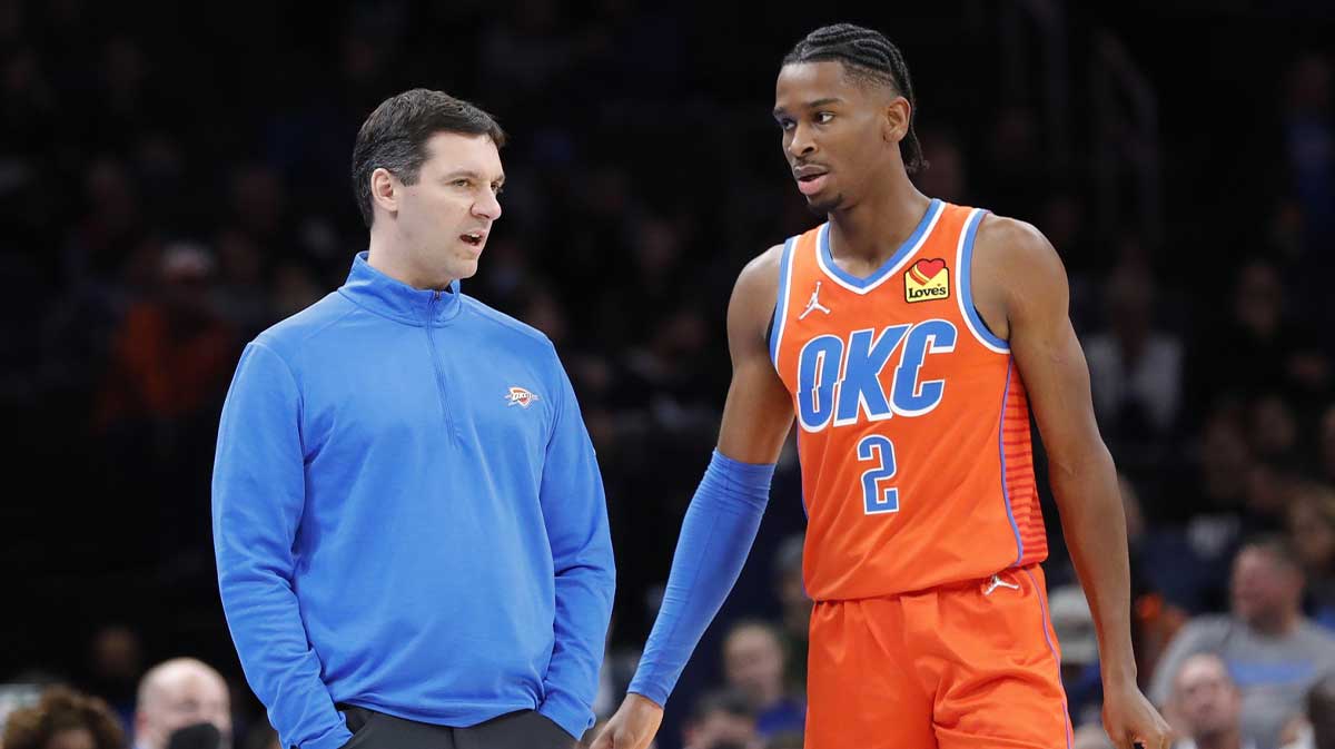 Thunder head coach Mark Daigneault talks with Oklahoma City Thunder guard Shai Gilgeous-Alexander (2) between plays against the Dallas Mavericks in the second half at Paycom Center. Dallas won 103-84