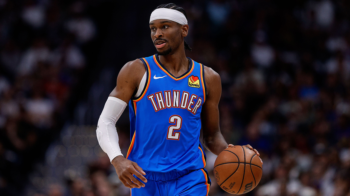 Thunder guard Shai Gilgeous-Alexander (2) dribbles the ball up court in the second quarter against the Denver Nuggets during game six of the second round for the 2025 NBA Playoffs at Ball Arena