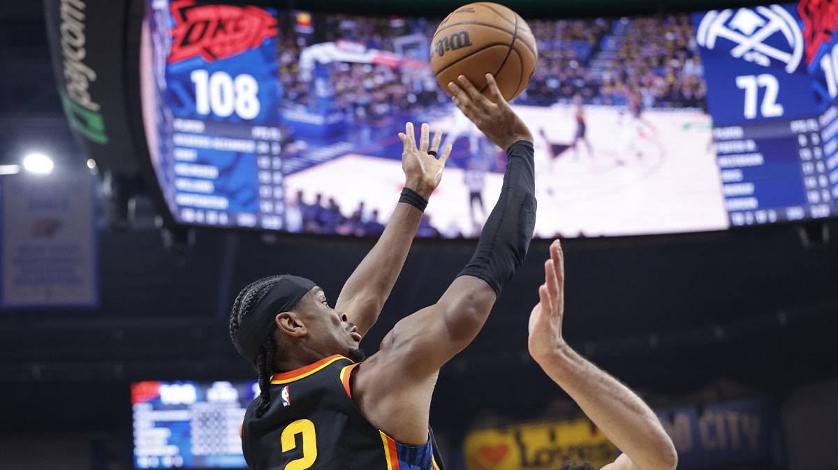 Thunder guard Shai Gilgeous-Alexander (2) shoots and scores a basket against the Denver Nuggets in the second half during game two of the second round for the 2025 NBA Playoffs at Paycom Center