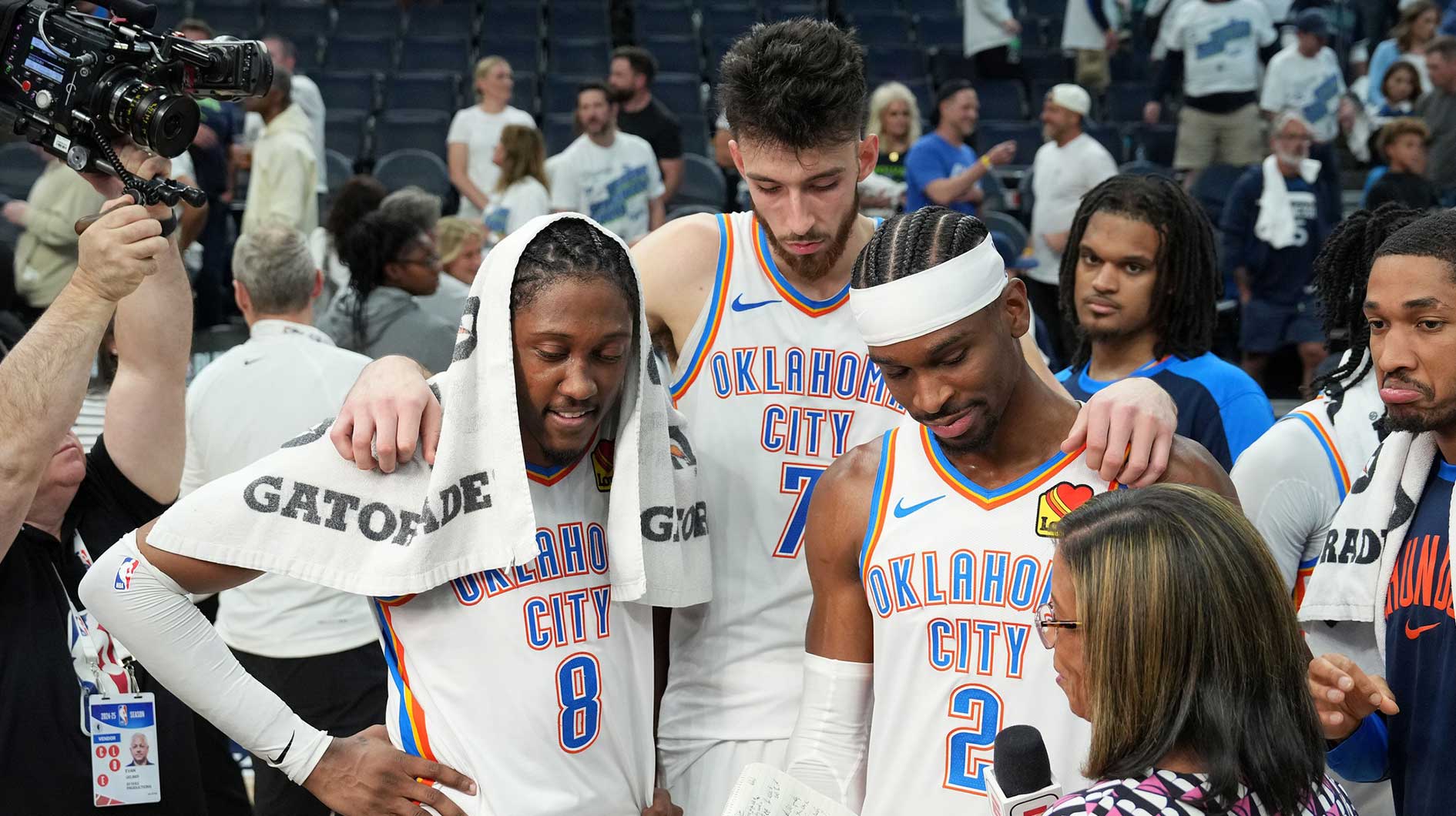 Thunder forward Jalen Williams (8), forward Chet Holmgren (7) and guard Shai Gilgeous-Alexander (2) talk to the media after defeating the Minnesota Timberwolves in game four of the western conference finals for the 2025 NBA Playoffs at Target Center