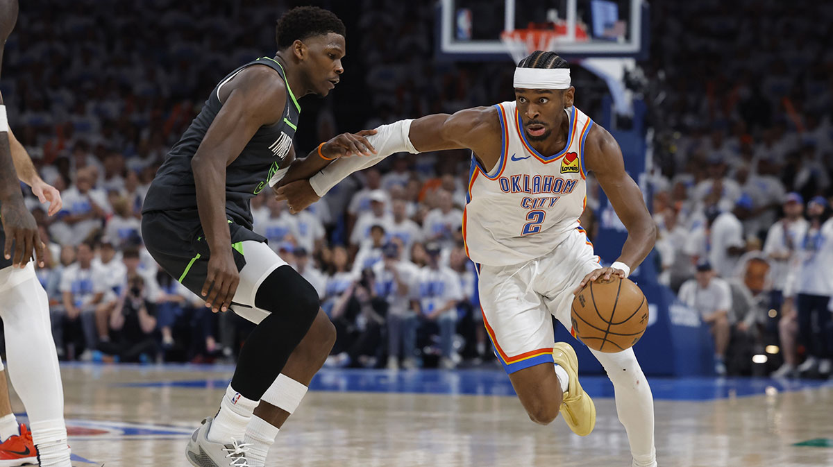 The Oklahoma City Thunder goalkeeper Shai Gilgeous-Alexander (2), the roads against the Minnesota Timberwolves goalkeeper, Anthony Edwards (5) in the fourth quarter in the match, one of the western conference finals for the NBA 2025 qualifiers at Paycom Center.