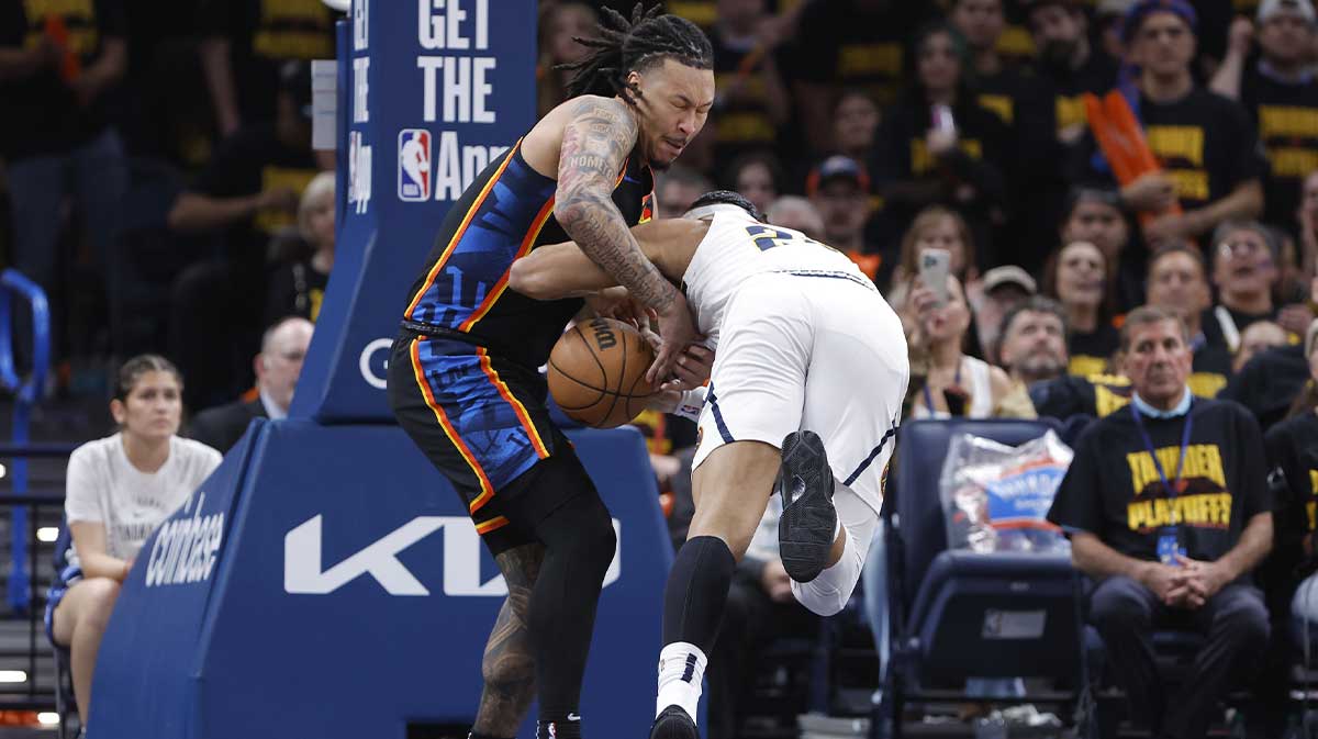 Thunder forward Jaylin Williams (6) steals the ball away from Denver Nuggets forward Zeke Nnaji (22) in the second half during game two of the second round for the 2025 NBA Playoffs at Paycom Center with Thunder head coach Mark Daigneault in the background