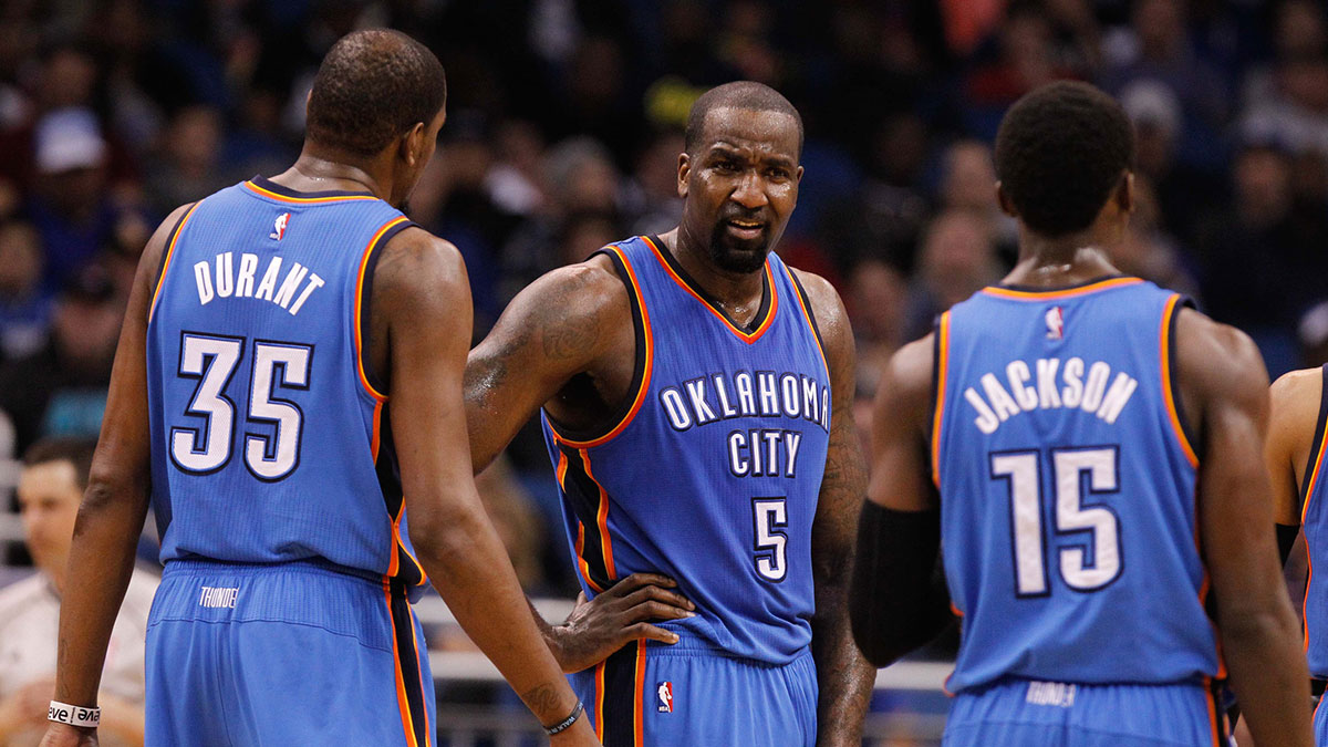 Thunder forward Kevin Durant (35), center Kendrick Perkins (5) and guard Reggie Jackson (15) talk against the Orlando Magic during the second quarter at Amway Center
