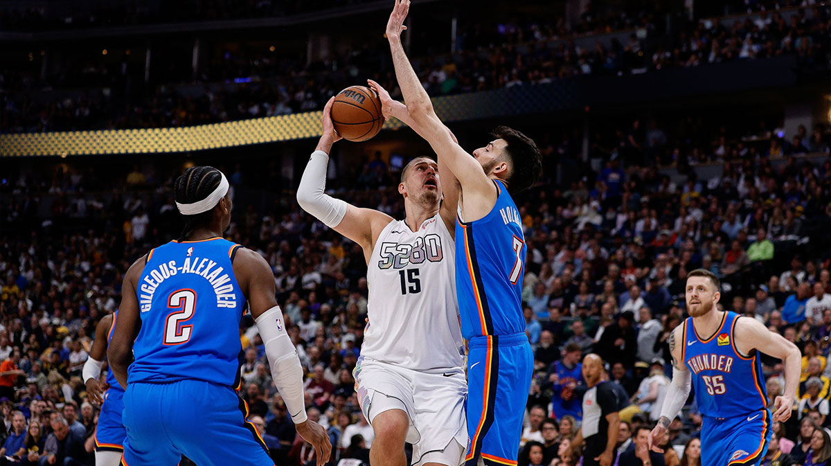 Thunder forward Chet Holmgren (7) as guard Shai Gilgeous-Alexander (2) defends in the third quarter during game six of the second round for the 2025 NBA Playoffs at Ball Arena
