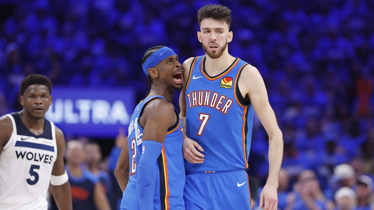 Thunder guard Shai Gilgeous-Alexander (2) and forward Chet Holmgren (7) celebrate after a play against the Minnesota Timberwolves in the third quarter during game two of the western conference finals for the 2025 NBA Playoffs at Paycom Center