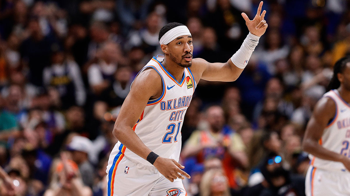 Thunder guard Aaron Wiggins (21) reacts after a basket in the fourth quarter against the Denver Nuggets during game four of the second round of the 2025 NBA Playoffs at Ball Arena with Thunder head coach Mark Daigneault in the background