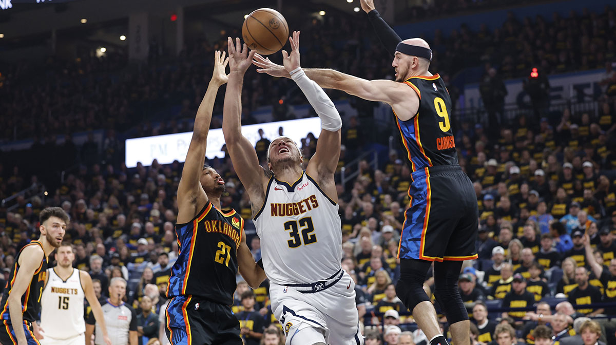 Thunder guard Aaron Wiggins (21) and guard Alex Caruso (9) in the second quarter during game two of the second round for the 2025 NBA Playoffs at Paycom Center