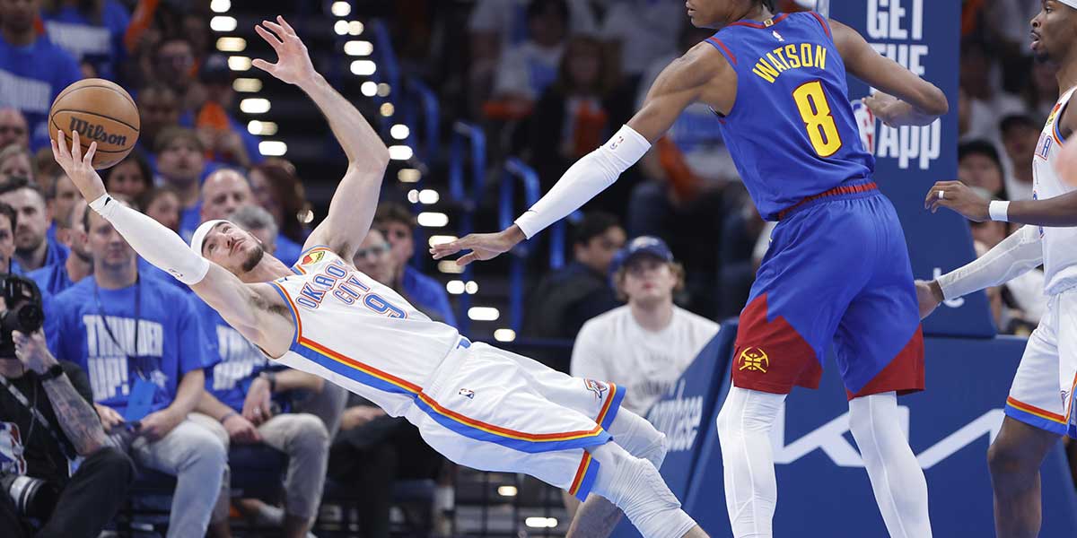 Thunder guard Alex Caruso (9) leans back and reaches for a loose ball as Denver Nuggets forward Peyton Watson (8) looks on during the second half of game five of the second round for the 2025 NBA Playoffs at Paycom Center
