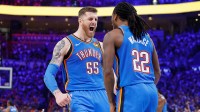 Thunder center Isaiah Hartenstein (55) celebrates with guard Cason Wallace (22) after a basket against the Denver Nuggets in the second half during game seven of the second round for the 2025 NBA Playoffs at Paycom Center