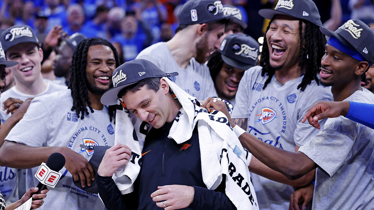 Thunder head coach Mark Daigneault celebrates with his team after defeating the Minnesota Timberwolves in game five to win the western conference finals for the 2025 NBA Playoffs at Paycom Center