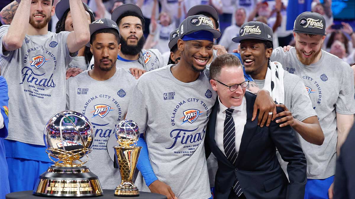 Thunder guard Shai Gilgeous-Alexander hugs Oklahoma City Thunder executive vice president and general manager Sam Presti after their team defeated the Minnesota Timberwolves in game five of the western conference finals for the 2025 NBA Playoffs at Paycom Center with Thunder head coach Mark Daigneault in the background