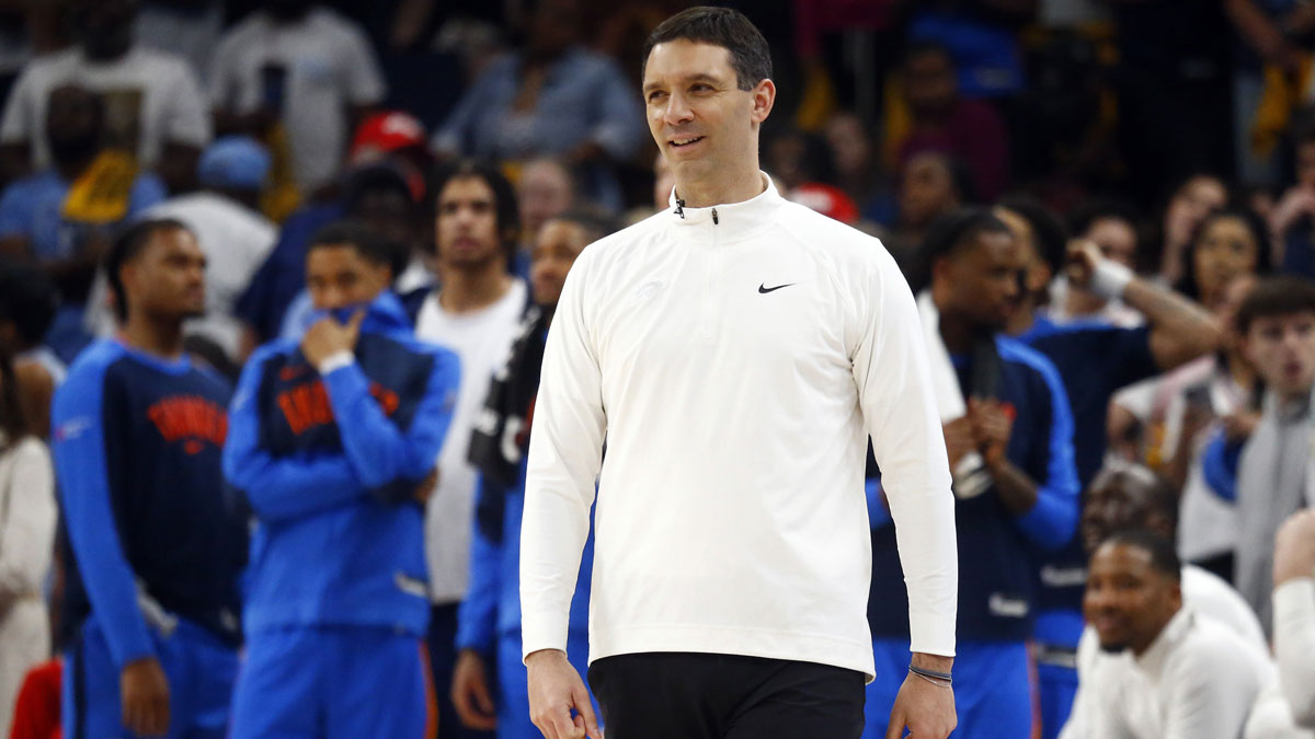 Thunder head coach Mark Daigneault reacts during the fourth quarter against the Memphis Grizzlies during game four for the first round of the 2024 NBA Playoffs at FedExForum with the Nuggets logo in the background