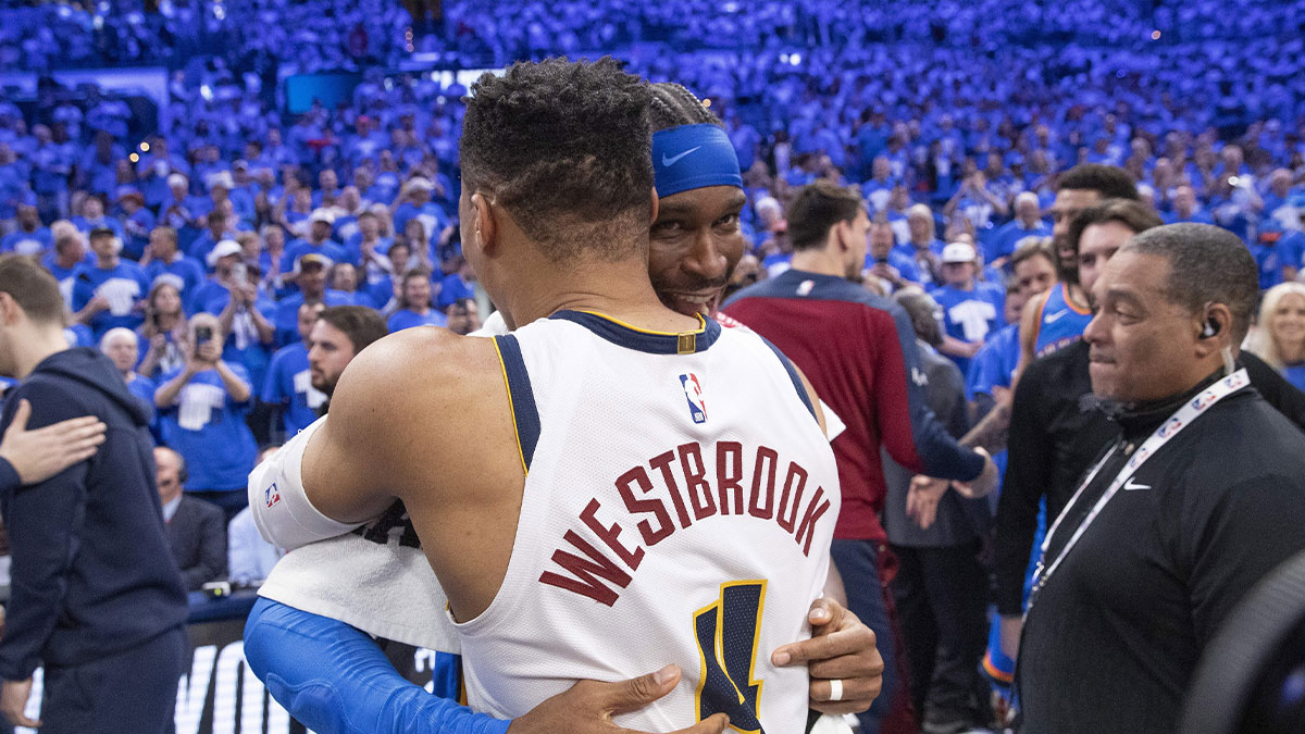 Oklahoma City Thunder guard Shai Gilgeous-Alexander (2) and Denver Nuggets guard Russell Westbrook (4) hug after their game seven of the second round for the 2025 NBA Playoffs at Paycom Center.