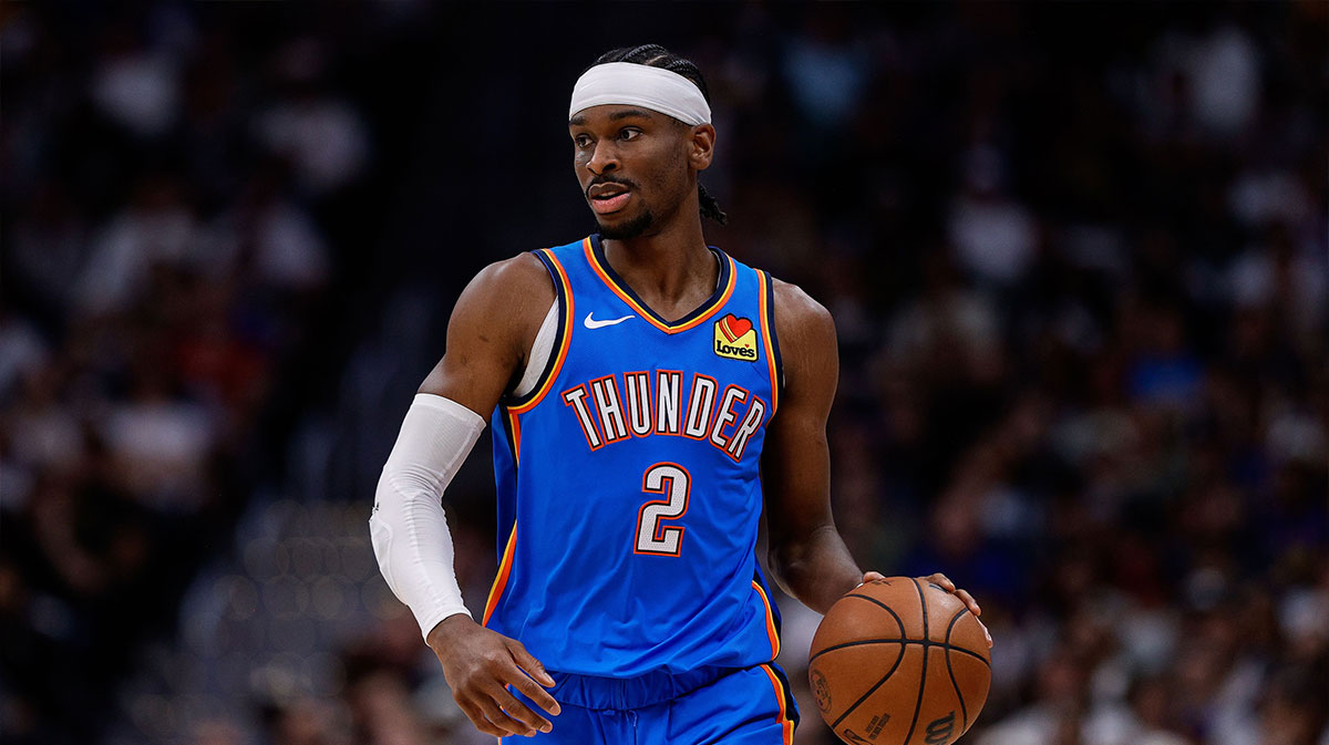 Oklahoma City Thunder guard Shai Gilgeous-Alexander (2) dribbles the ball up court in the second quarter against the Denver Nuggets during game six of the second round for the 2025 NBA Playoffs at Ball Arena.