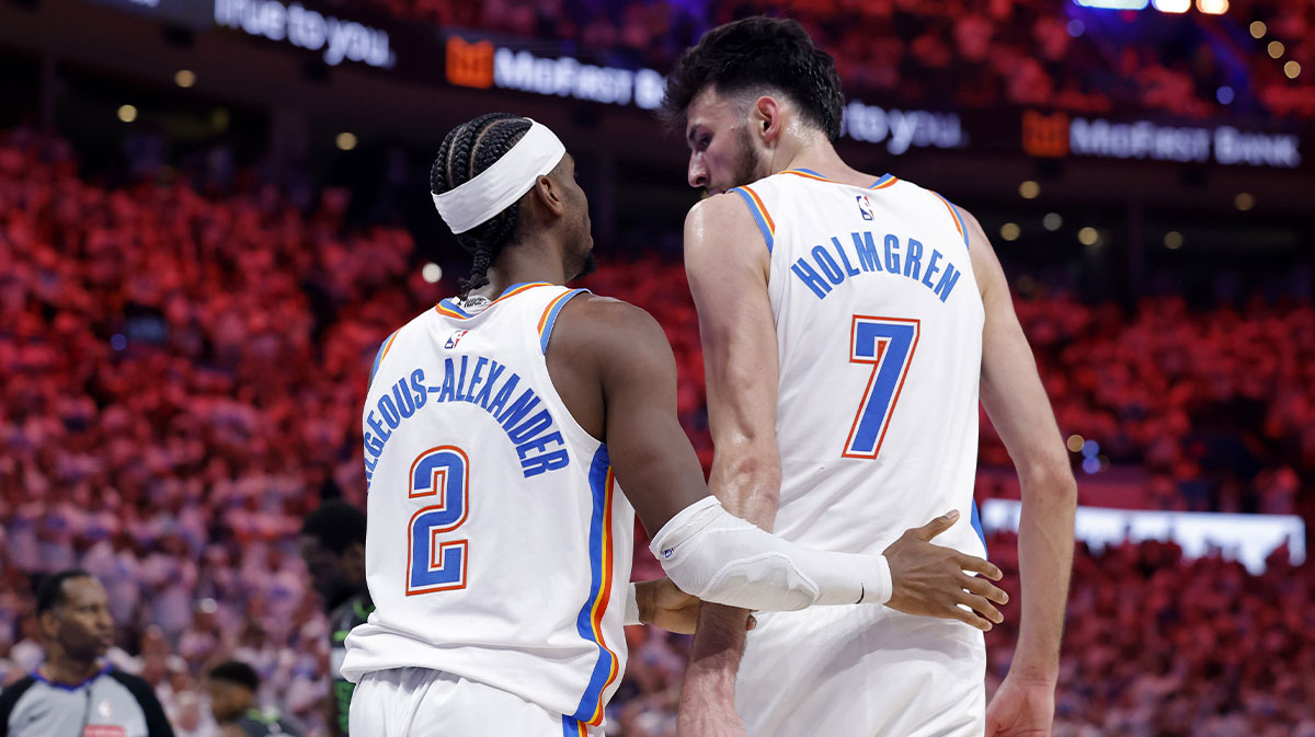 Thunder guard Shai Gilgeous-Alexander (2) and forward Chet Holmgren (7) react after a play in the fourth quarter against the Minnesota Timberwolves during game one of the western conference finals for the 2025 NBA Playoffs at Paycom Center