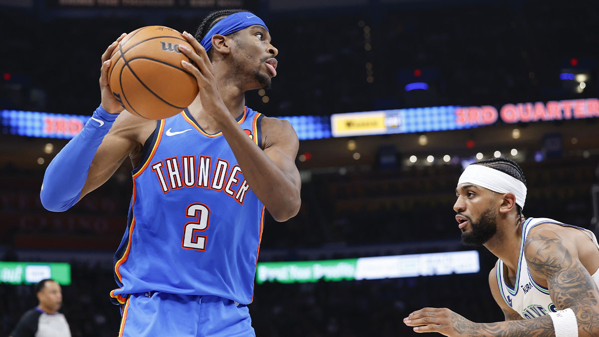 Thunder guard Shai Gilgeous-Alexander (2) moves to the basket against Minnesota Timberwolves guard Nickeil Alexander-Walker (9) during the second half at Paycom Center