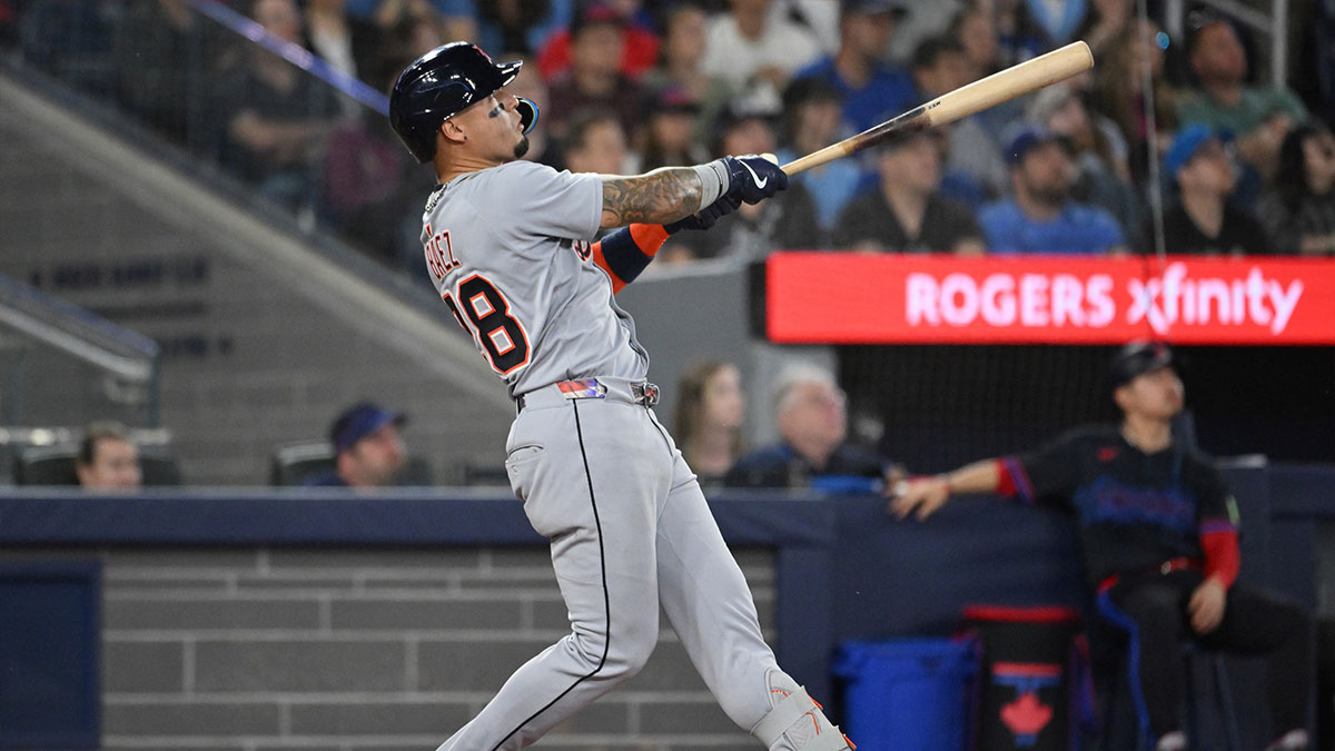 Detroit Tigers center fielder Javier Baez (28) hits a solo home run against the Toronto Blue Jays in the eighth inning at Rogers Centre.