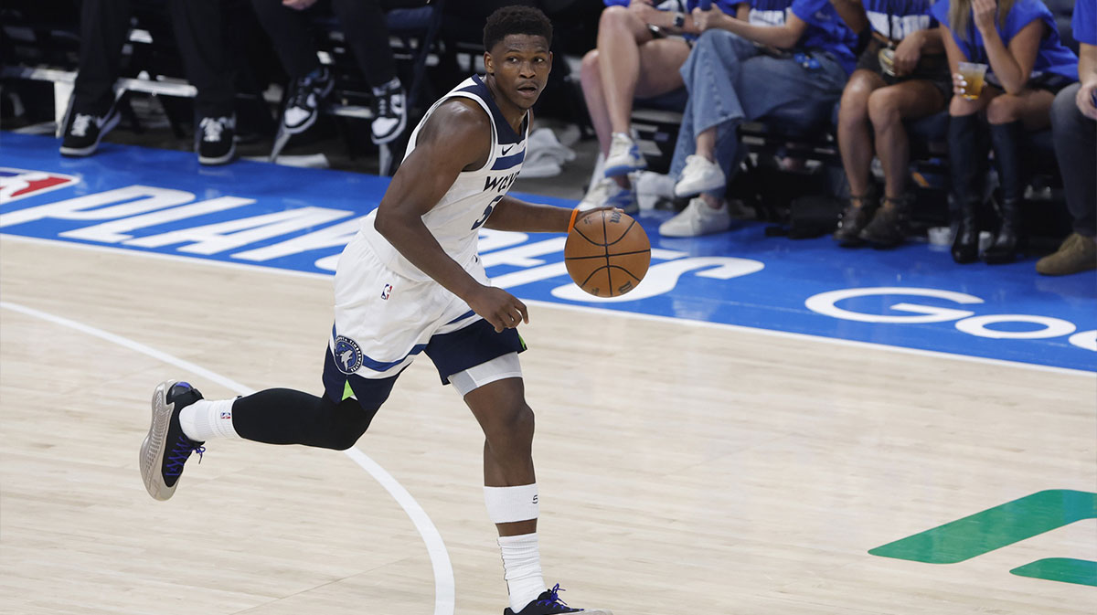 Minnesota Timberwolves guard Anthony Edwards (5) dribbles against the Oklahoma City Thunder in the second quarter during game two of the western conference finals for the 2025 NBA Playoffs at Paycom Center.