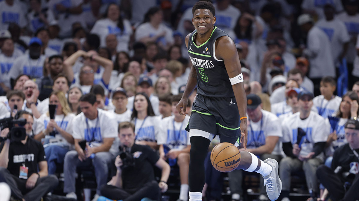 Minnesota Timberwolves guard Anthony Edwards (5) dribbles against the Oklahoma City Thunder in the second quarter during game one of the western conference finals for the 2025 NBA Playoffs at Paycom Center.