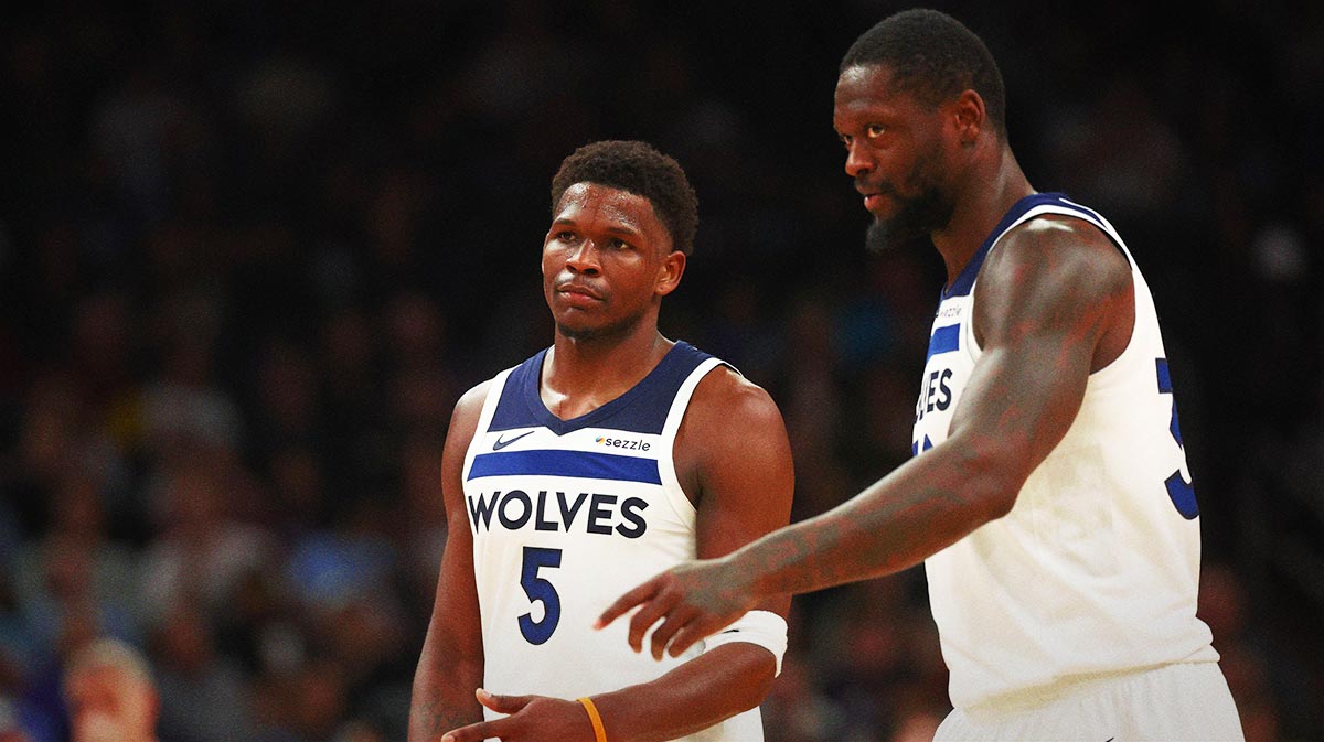 Minnesota Timberwolves guard Anthony Edwards (5) with forward Julius Randle (30) against the Phoenix Suns at Footprint Center.