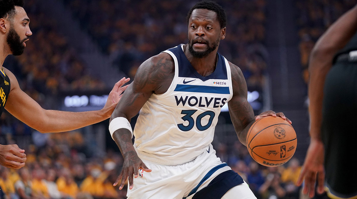 Minnesota Timberwolves forward Julius Randle (30) dribbles the ball against the Golden State Warriors in the first quarter during game four of the second round for the 2025 NBA Playoffs at Chase Center.
