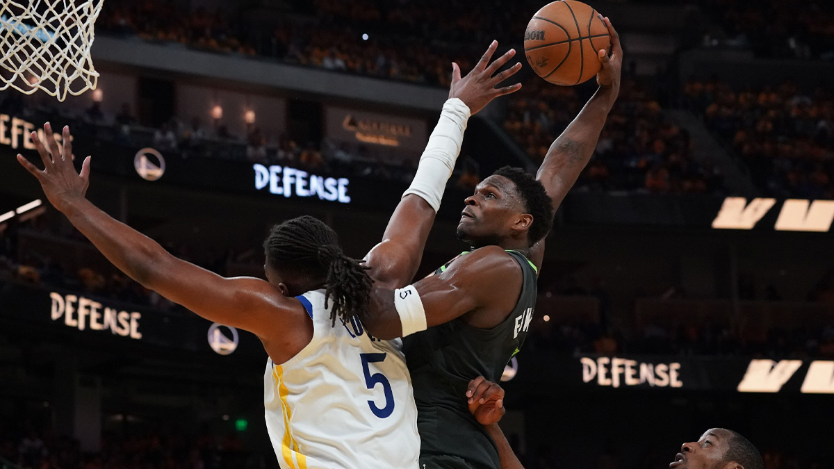 Minnesota Timberwolves guard Anthony Edwards (5) dunks over Golden State Warriors forward Kevon Looney (5) in the third quarter during game three in the second round for the 2025 NBA Playoffs at Chase Center.