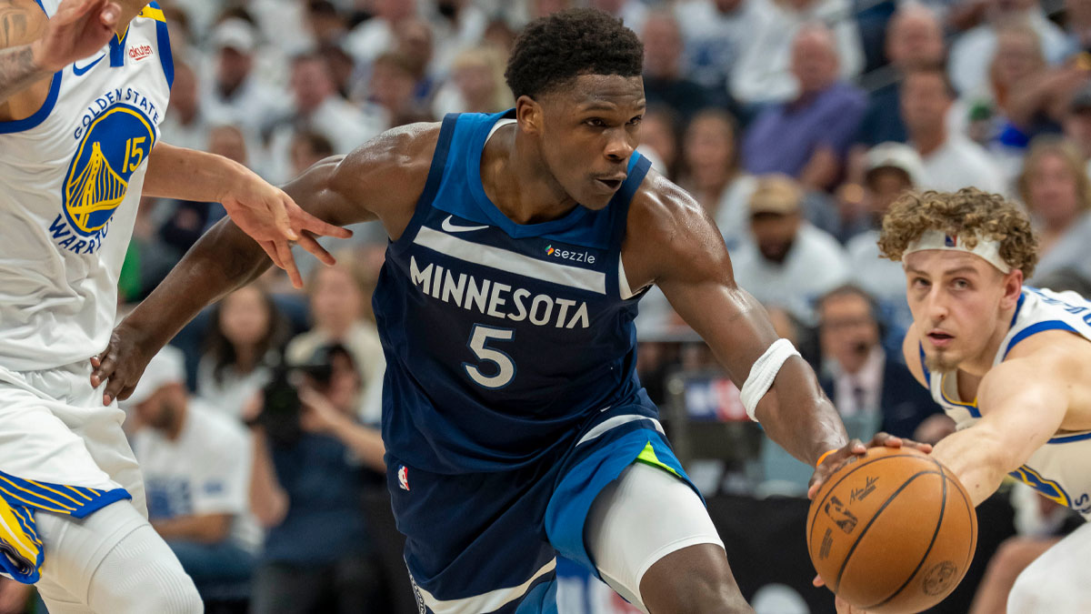 Minnesota Timberwolves guard Anthony Edwards (5) drives to the basket against the Golden State Warriors in the first half during game two of the second round for the 2025 NBA Playoffs at Target Center.