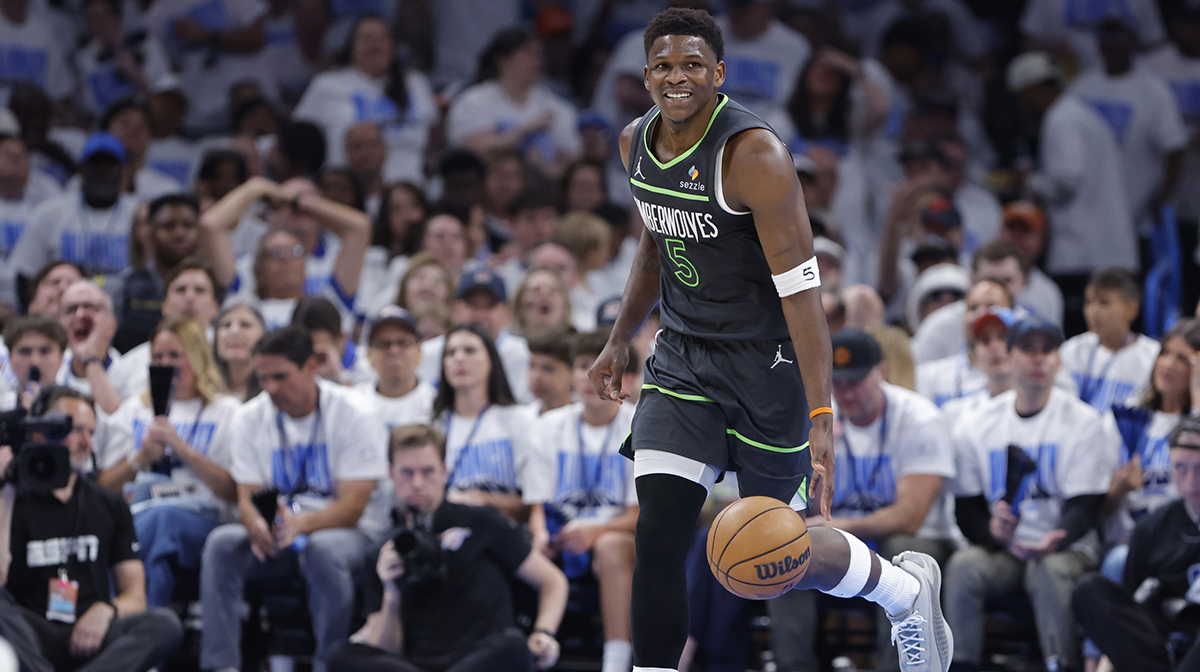 Minnesota Timberwolves guard Anthony Edwards (5) dribbles against the Oklahoma City Thunder in the second quarter during game one of the western conference finals for the 2025 NBA Playoffs at Paycom Center.