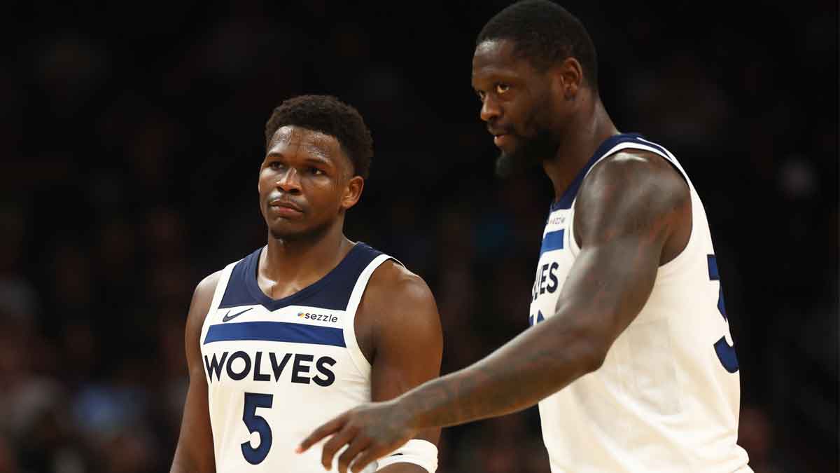 Minnesota Timberwolves guard Anthony Edwards (5) with forward Julius Randle (30) against the Phoenix Suns at Footprint Center.