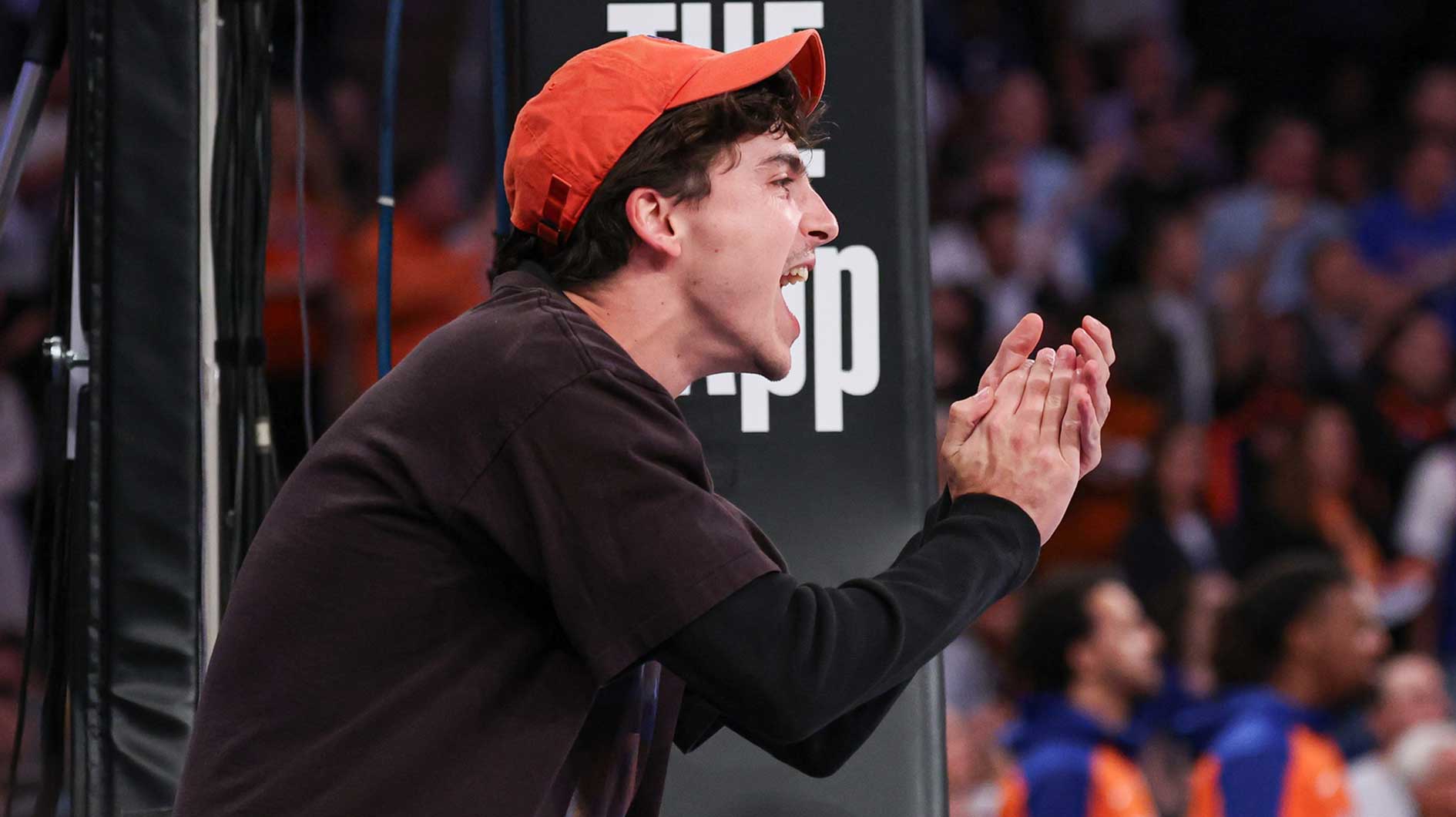 Actor Timothee Chalamet cheer while sitting curtsied in the second half during game four of the second round for the 2025 NBA Playoffs between the New York Knicks and the Boston Celtics at Madison Square Garden.