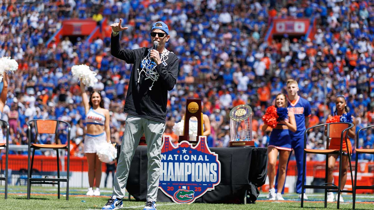 Florida Gators head coach Todd Golden addresses the crowd during the National Championship celebration at Ben Hill Griffin Stadium.
