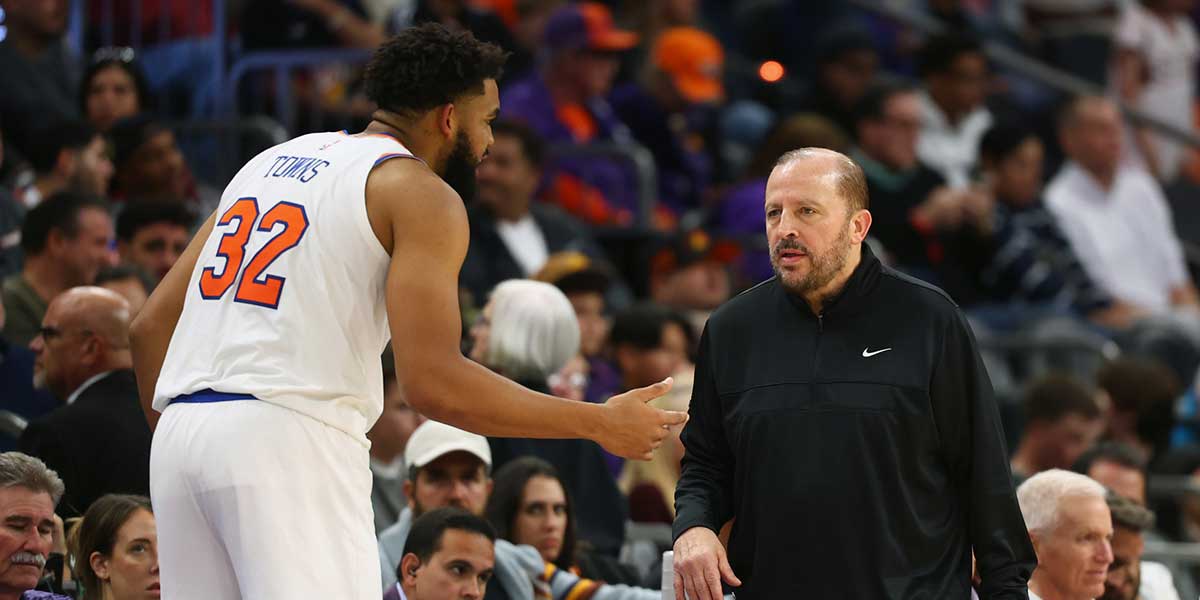 New York Knicks head coach Tom Thibodeau with center Karl-Anthony Towns (32) against the Phoenix Suns at Footprint Center.