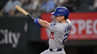 Apr 20, 2025; Arlington, Texas, USA; Los Angeles Dodgers center fielder Tommy Edman (25) bats during the game between the Texas Rangers and the Los Angeles Dodgers at Globe Life Field.