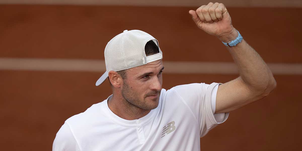 Tommy Paul of the United States celebrates winning his match against Marton Fucsovics of Hungary on day four at Roland Garros Stadium.