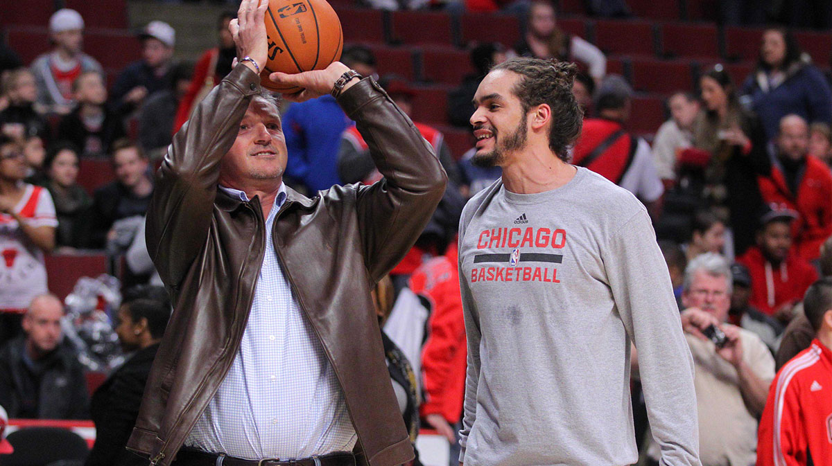 Chicago Bulls center Joakim Noah (right) and former Bull forward Toni Kukoc (left) prior to a game against the Philadelphia 76ers at the United Center.